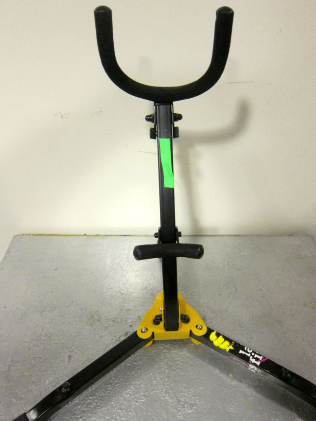 This crappy little piece of green tape is super useful. It makes the stand really easy to find in the dark.